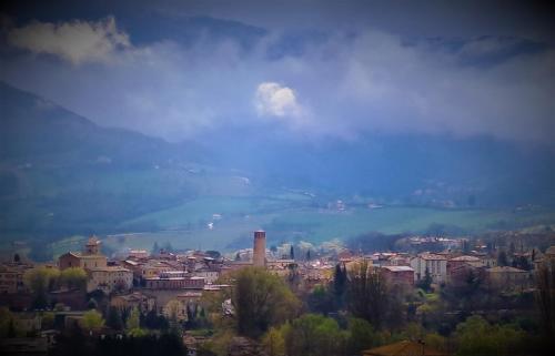 a cityscape of a city with a view of a town at San Lorenzo in Cerreto dʼEsi