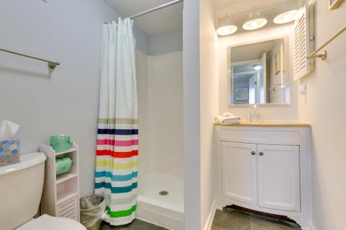a bathroom with a sink and a toilet and a shower at Walk to Beach Hilton Head Condo with Golf Views in Hilton Head Island