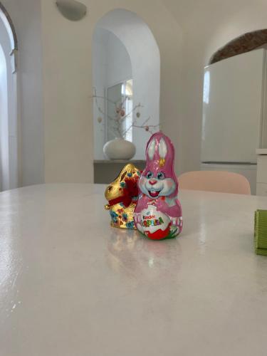 a small figurine sitting on top of a table at Bistrot del mare in Santo Stefano al Mare