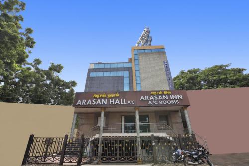 a building with a gate in front of it at Capital O Jayam Residency in Chennai