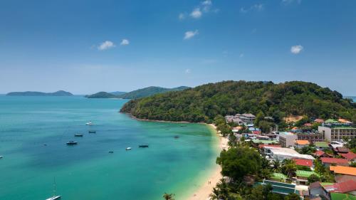 an aerial view of a beach with boats in the water at mona seaview pool villa beach front AoYon Beach in Ban Ao Makham