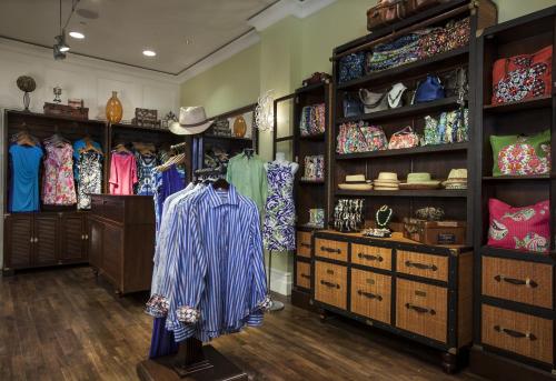 a clothing store with dresses and hats on display at Sandpearl Resort Private Beach in Clearwater Beach
