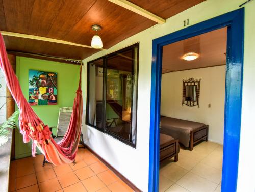 Postel nebo postele na pokoji v ubytování Cabinas Jacaranda