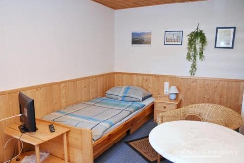 Postel nebo postele na pokoji v ubytování GARNI