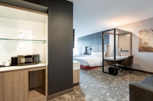 Ένα ή περισσότερα κρεβάτια σε δωμάτιο στο SpringHill Suites by Marriott Chester