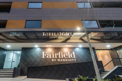 a sign on the front of a building at Fairfield by Marriott Medellin Sabaneta in Medellín