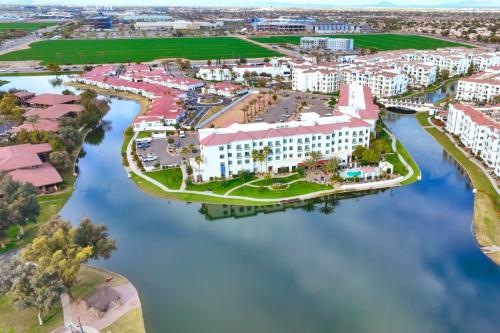 an aerial view of a resort on the water at Residence Inn by Marriott Phoenix Chandler/South in Chandler