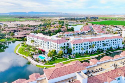an aerial view of a resort with a body of water at Residence Inn by Marriott Phoenix Chandler/South in Chandler
