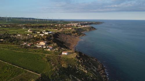 an aerial view of a village on the edge of the ocean at Casa De Santis - Roby e Fra al mare Cavallucci in Isola Capo Rizzuto