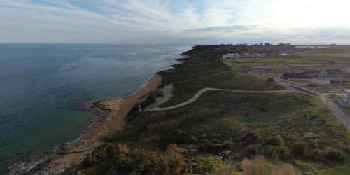 an aerial view of the ocean and a coast at Casa De Santis - Roby e Fra al mare Cavallucci in Isola Capo Rizzuto