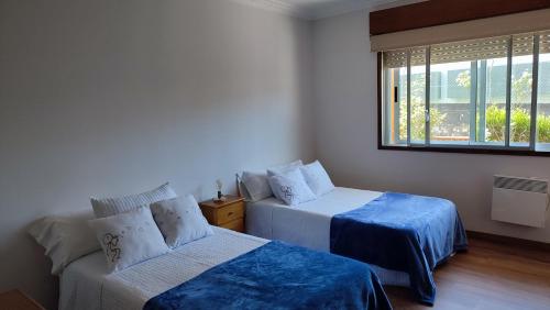 Giường trong phòng chung tại A Canexa