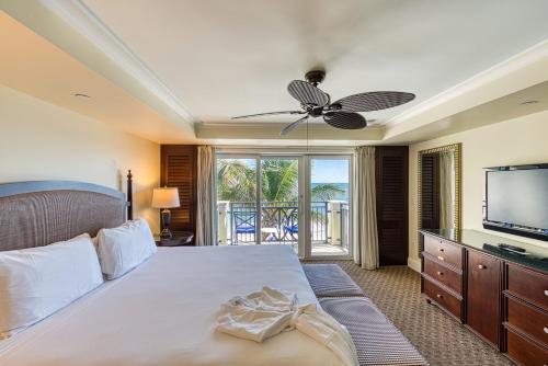 Ένα ή περισσότερα κρεβάτια σε δωμάτιο στο Kimpton Vero Beach Hotel & Spa by IHG