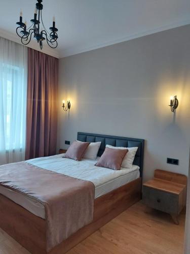 Ένα ή περισσότερα κρεβάτια σε δωμάτιο στο Chilagir_garden