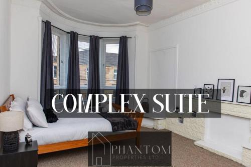 Postel nebo postele na pokoji v ubytování Complex Suite