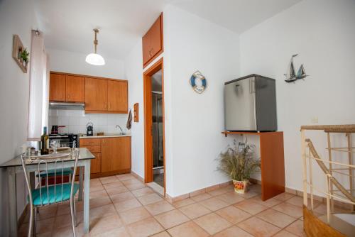 Kuchyň nebo kuchyňský kout v ubytování Elounda Square Home