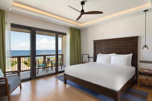 Łóżko lub łóżka w pokoju w obiekcie InterContinental Dominica Cabrits Resort & Spa by IHG