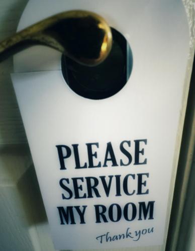 a door tag that says please service my room at The Manor House Inn in Shotley Bridge