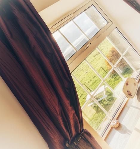 a view of a window in a room at The Manor House Inn in Shotley Bridge