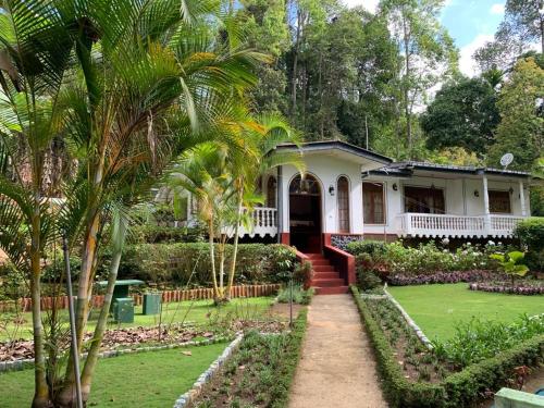 Um jardim em Eeshani Guest Inn