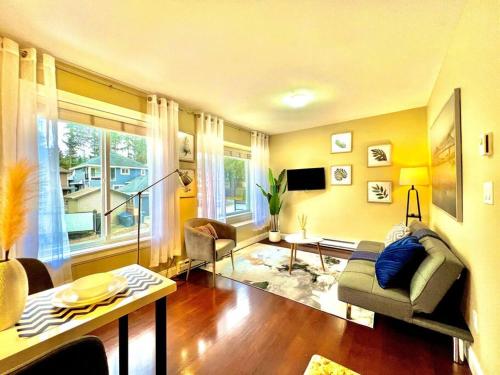 a living room with a couch and a table at The Royal Suite in Surrey