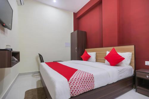 Postel nebo postele na pokoji v ubytování Hotel O Sewa Residency