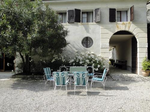 a table and chairs in front of a building at Villa Barberina in Valdobbiadene