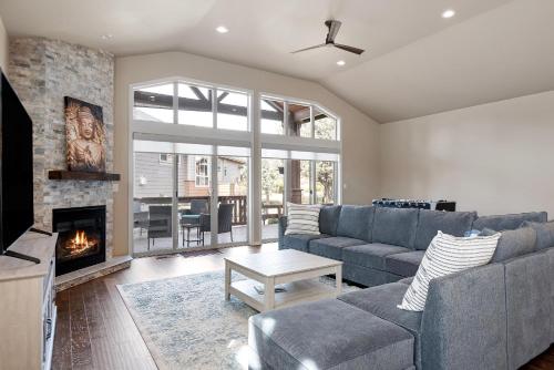a living room with a couch and a fireplace at HomeAway Vacation Rental - Eagle Crest - Meredith Lodging in Redmond