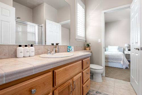 a bathroom with a sink and a toilet at HomeAway Vacation Rental - Eagle Crest in Redmond