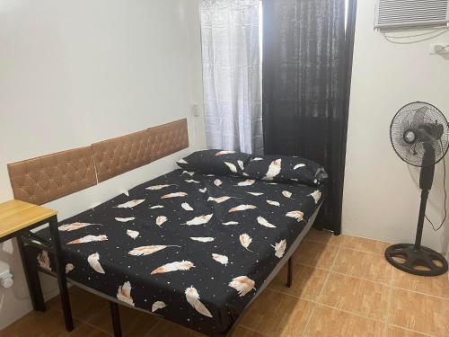 Postel nebo postele na pokoji v ubytování Staycation @Bali Oasis 2- 2BR unit with sunset view
