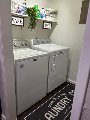a white washer and dryer in a room at Eagle Stay in Eagle Pass