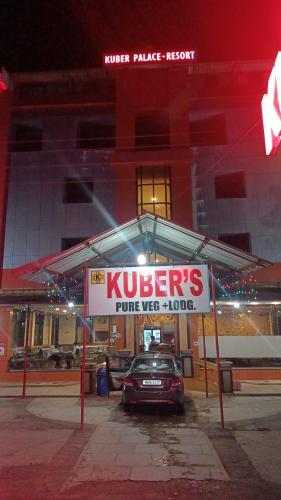 a car is parked in front of a building at Kuber's Residency in Mahad