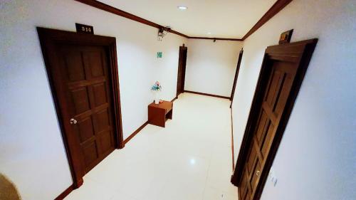 an empty room with an open door and a box at Fruit Paradise in Patong Beach