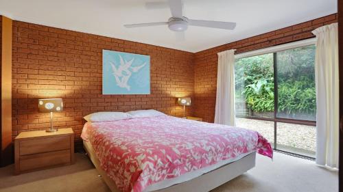 Postel nebo postele na pokoji v ubytování Unit 3 11 Beach Street Merimbula