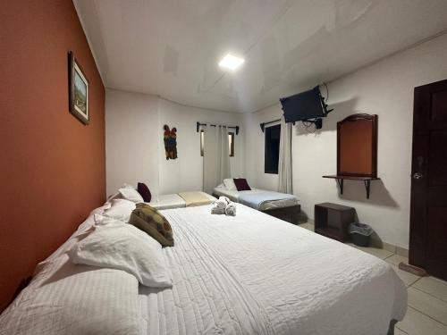 Katil atau katil-katil dalam bilik di Hotel Pacande B&B