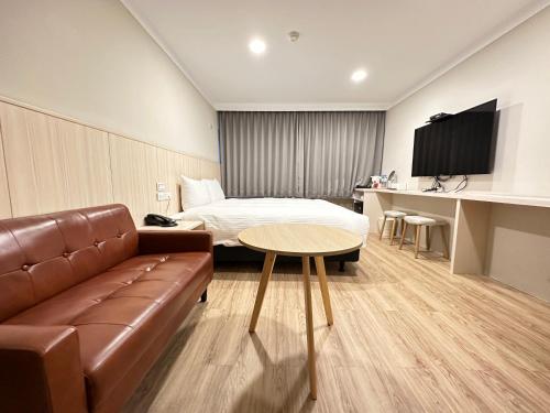 TV a/nebo společenská místnost v ubytování Yoshi Hotel - Tainan Station Branch