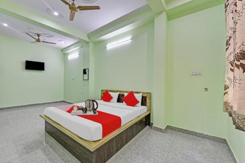 Ένα ή περισσότερα κρεβάτια σε δωμάτιο στο Hotel O Jmd Hotel