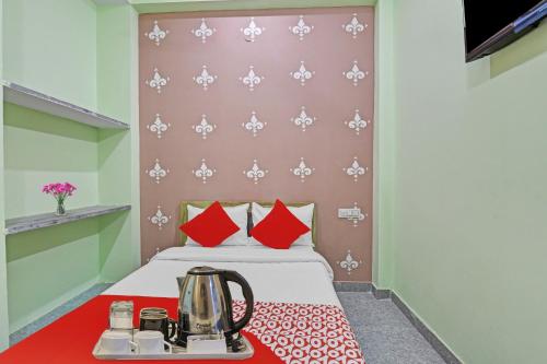 Ένα ή περισσότερα κρεβάτια σε δωμάτιο στο Hotel O Jmd Hotel