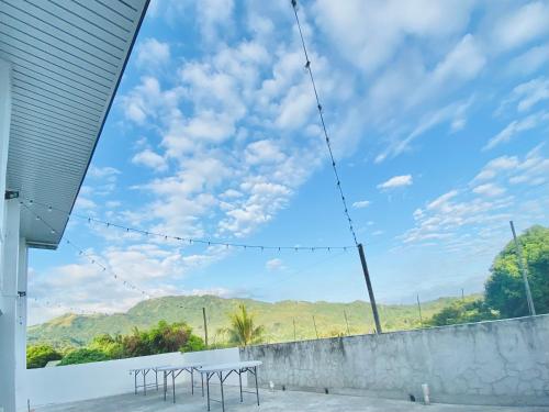 a view from the patio of a house with a table at The Mansion - Olongapo in Olongapo