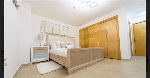 Postel nebo postele na pokoji v ubytování Marbella Juan dolio beach front luxury apartment