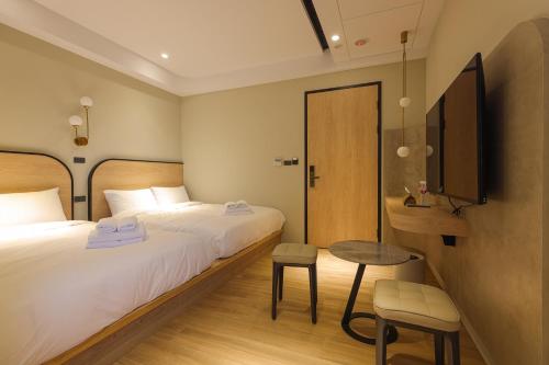 Katil atau katil-katil dalam bilik di Sea Thought B&B
