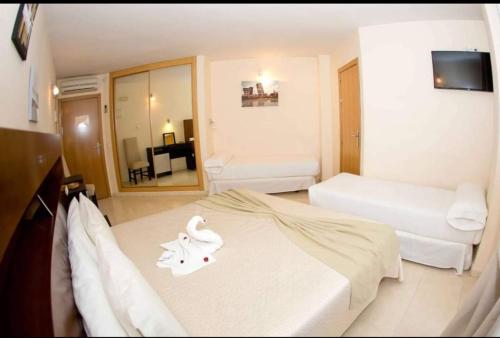 A television and/or entertainment centre at Hostal San Marcos