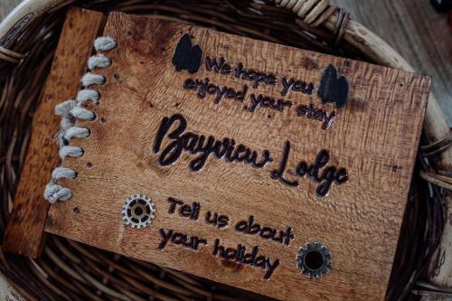 a sign that says whatever you wanna do tell us about your baby at Bayview Lodge - Views Views Views! in St Helens
