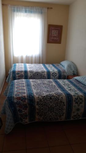 Postel nebo postele na pokoji v ubytování Desert Escapes