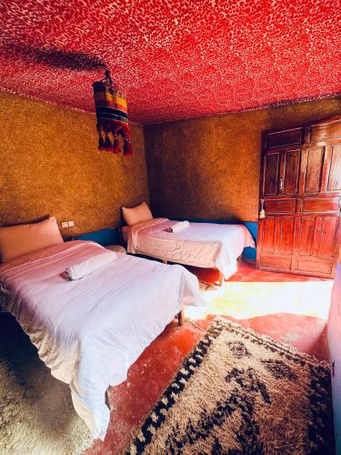 Paradis Touaregにあるベッド