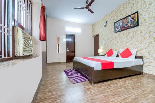 a bedroom with a bed in a room at Flagship Ki & Ka Villa in Patna