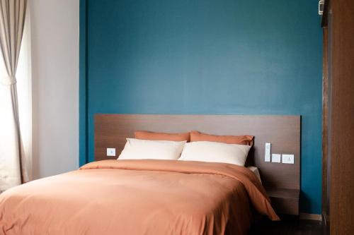 Postel nebo postele na pokoji v ubytování Kibu Apartments
