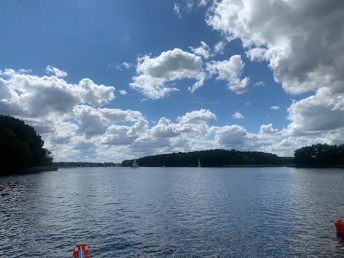 a large body of water with clouds in the sky at MAŁY PORT-Iława - Jezioro - Plaża - Marina priv - 5 pokoi VIP - czysto na 10 in Iława
