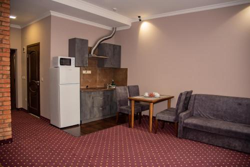 Kuchyň nebo kuchyňský kout v ubytování T&S Apart-Hotel