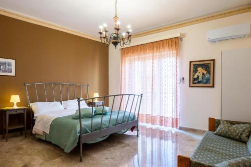 A bed or beds in a room at Apartment Helios