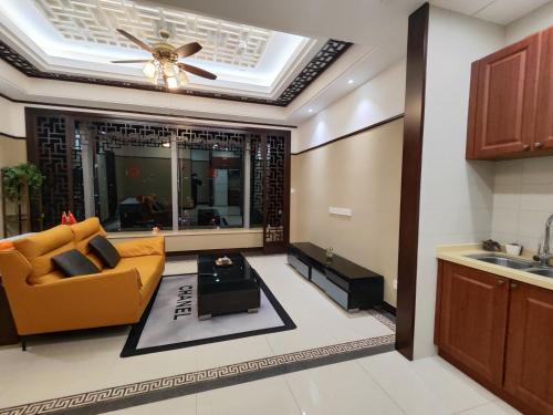 Ruang duduk di Suzhou Goethe Hotel Apartment Jinji Lake Branch
